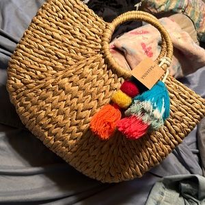 Selling a brand new savanna beach tote with tags